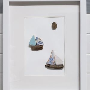 Sea pottery and driftwood sailboats